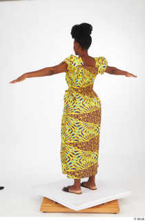 Dina Moses dressed standing t poses whole body yellow long…